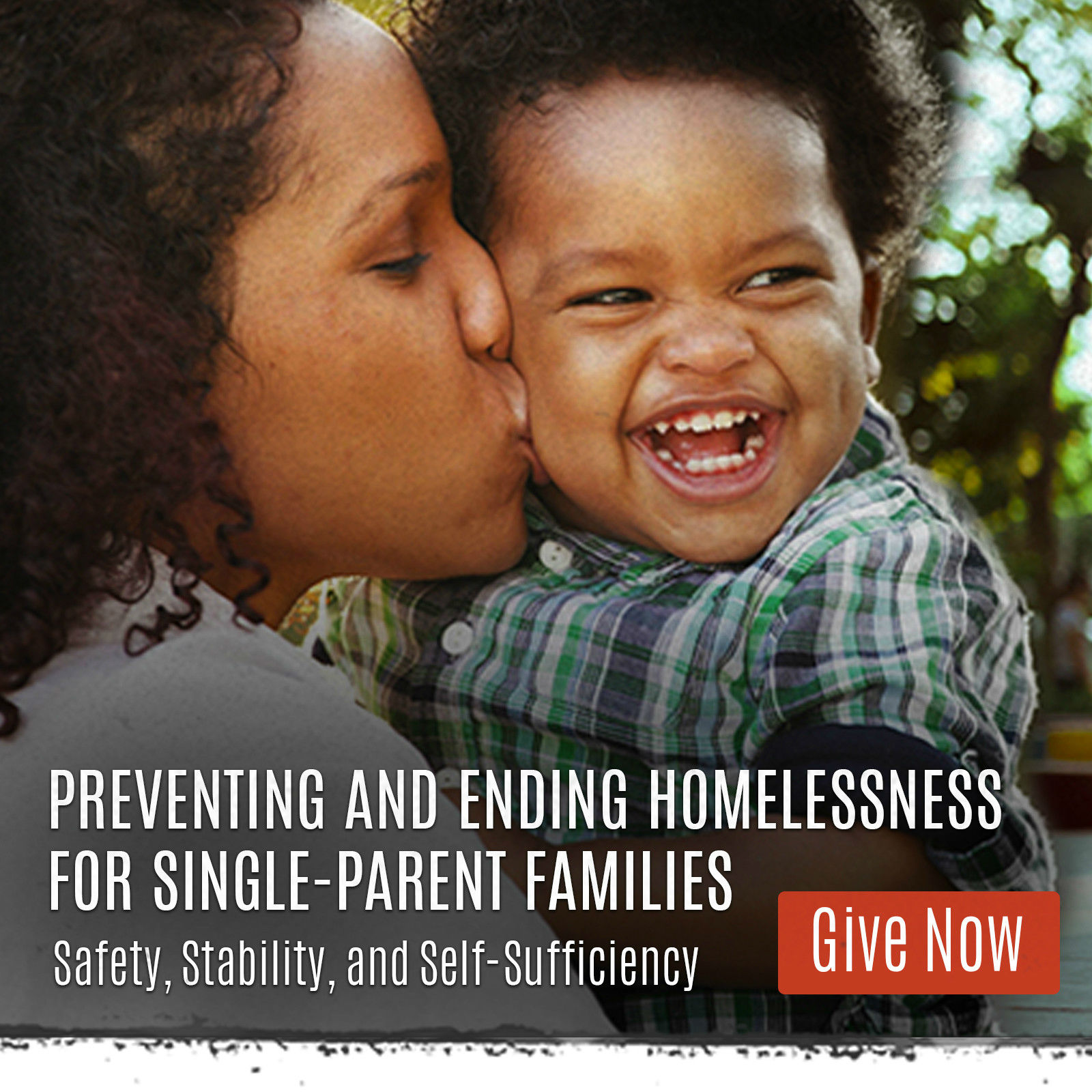 Mom kissing smiling baby - Click to give and provide safety, stability and self-sufficiency for families facing homelessness. 